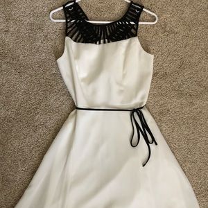 White and black cocktail dress.